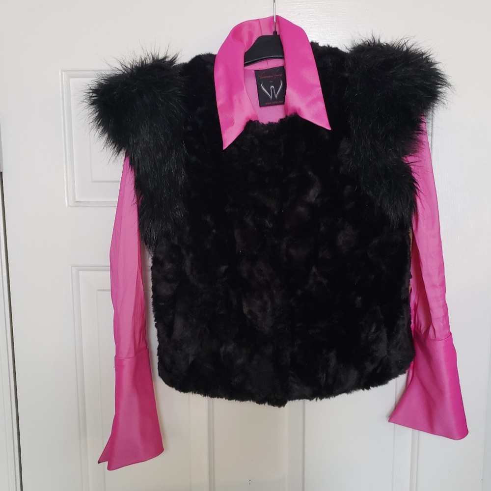 A pick shirt with  fury vest connected